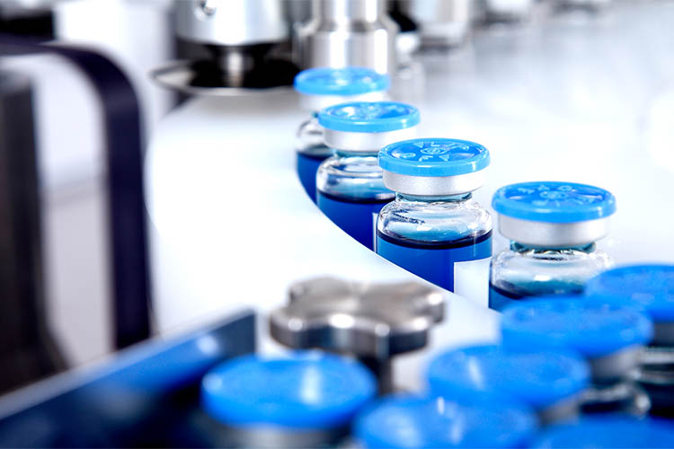 vials on a manufacturing line