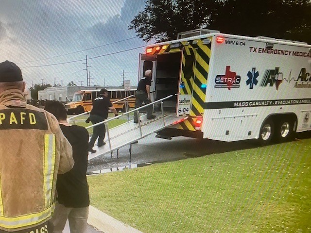 SETRAC  team and EMT vehicles at a scholl in Uvalde, TX
