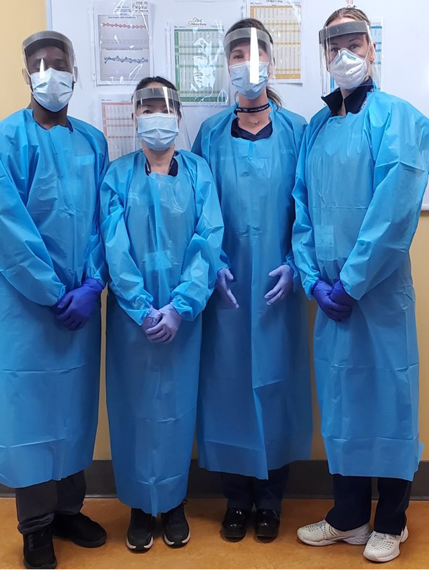 RESPTC staff donning Transmission-based PPE