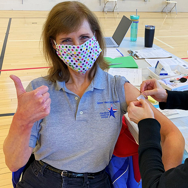 MRC volunteer getting vaccinated